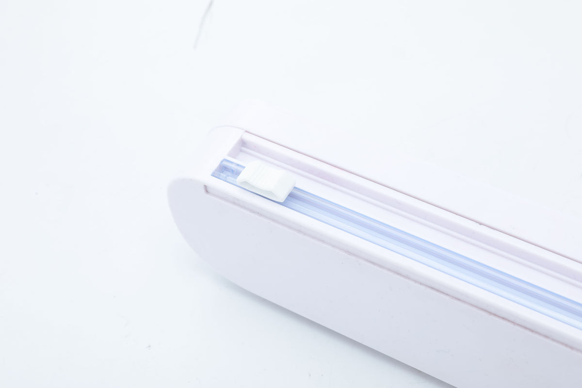 Plastic Wrap Cutter - Mount it somewhere for easy access